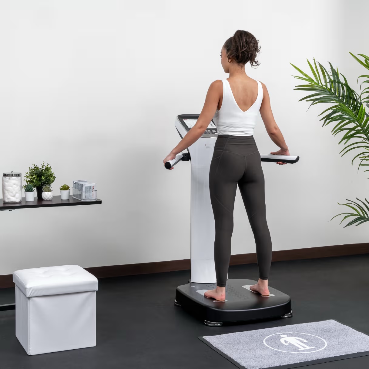 A patient standing on the InBody 970 body composition analyzer